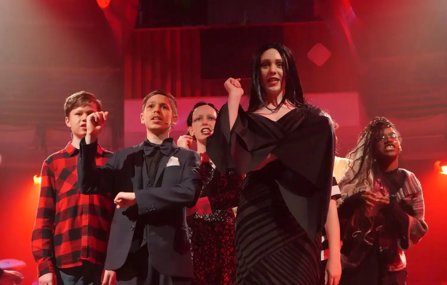 The Grange School Senior pupils performing in a theatre production of The Addams Family.