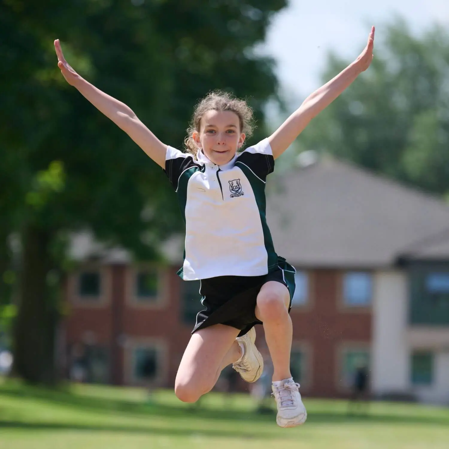 The Grange School Junior pupil doing Long jumping.