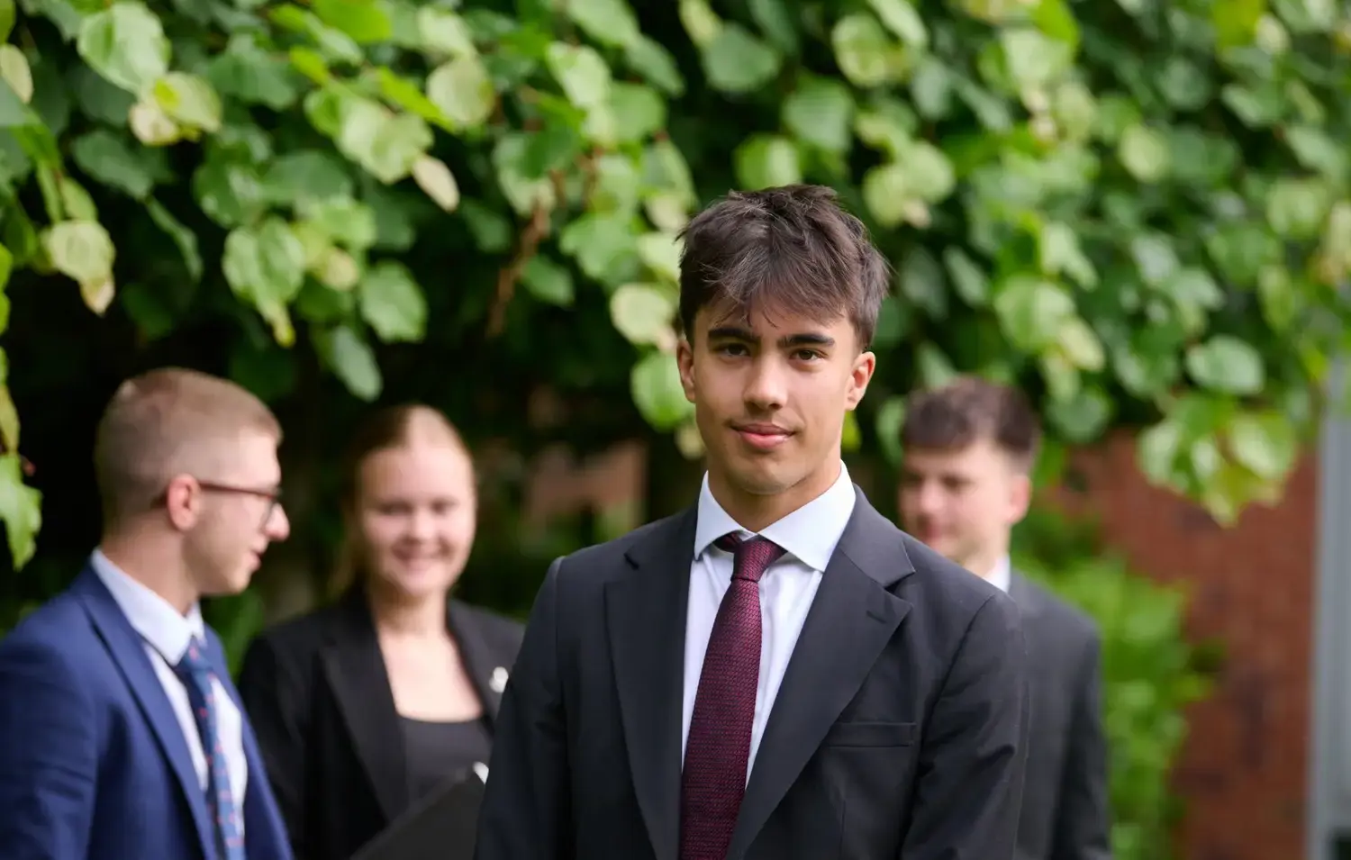 The Grange School Sixth Form pupils outside.