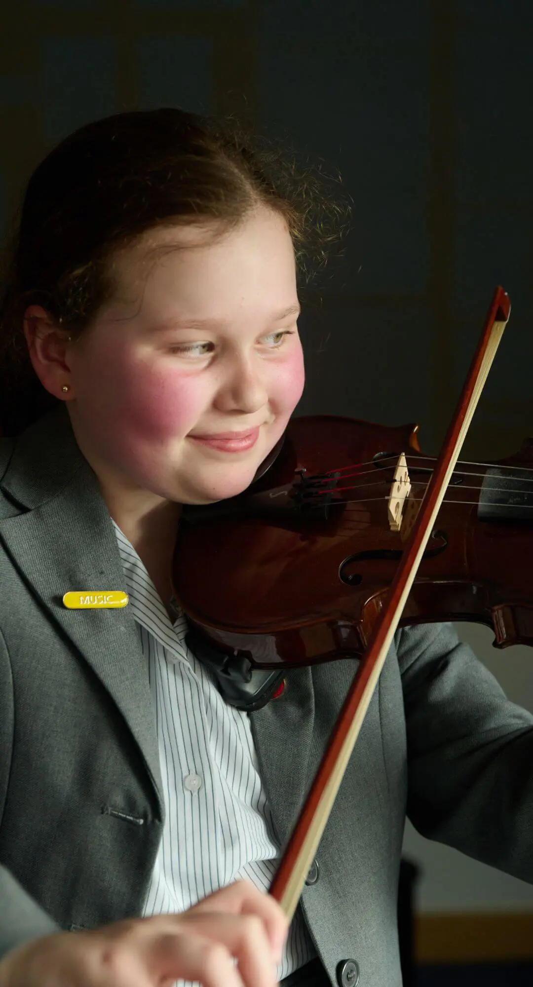 The Grange School pupil playing the violin.