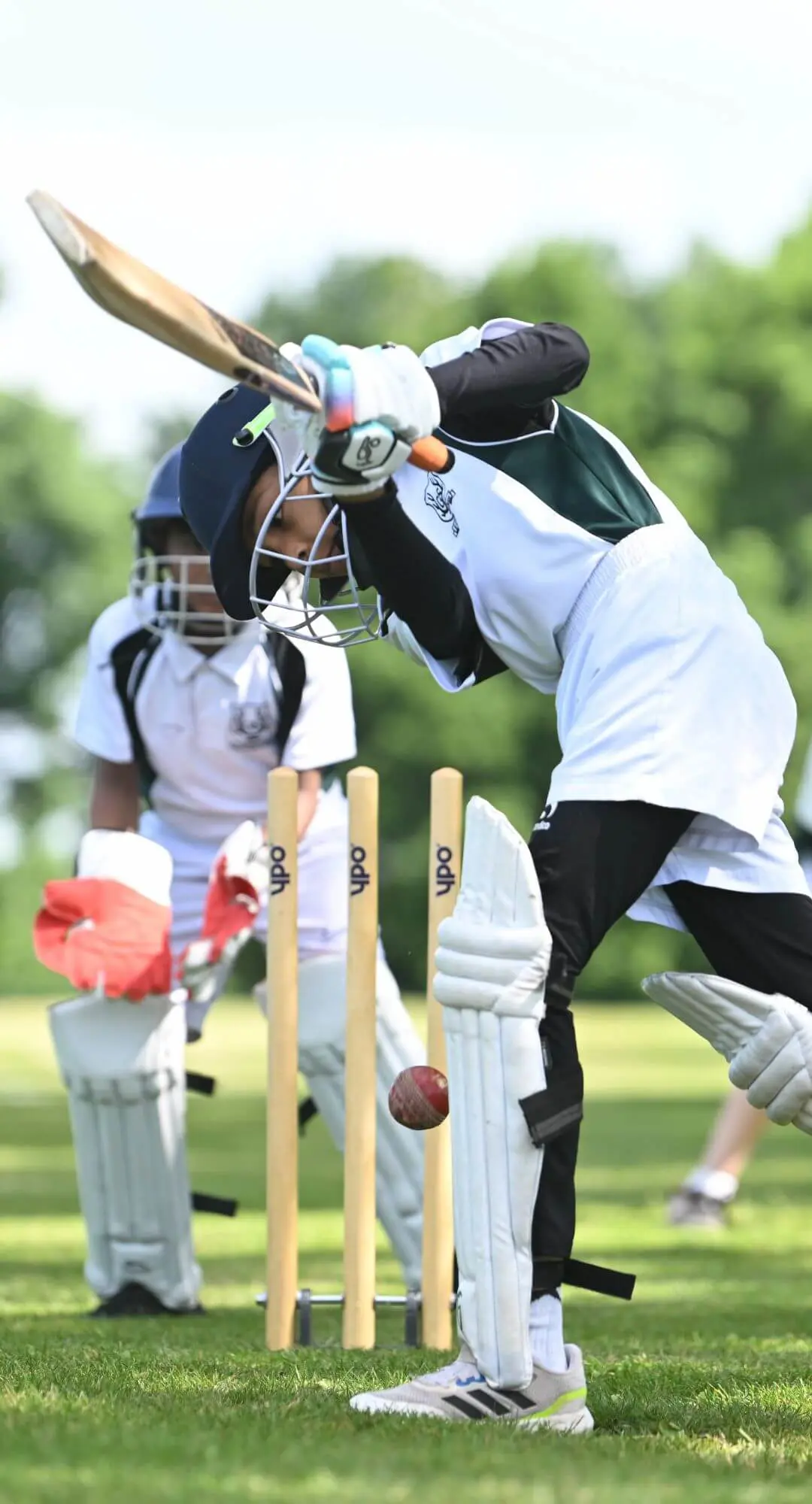 The Grange School pupils playing cricket.