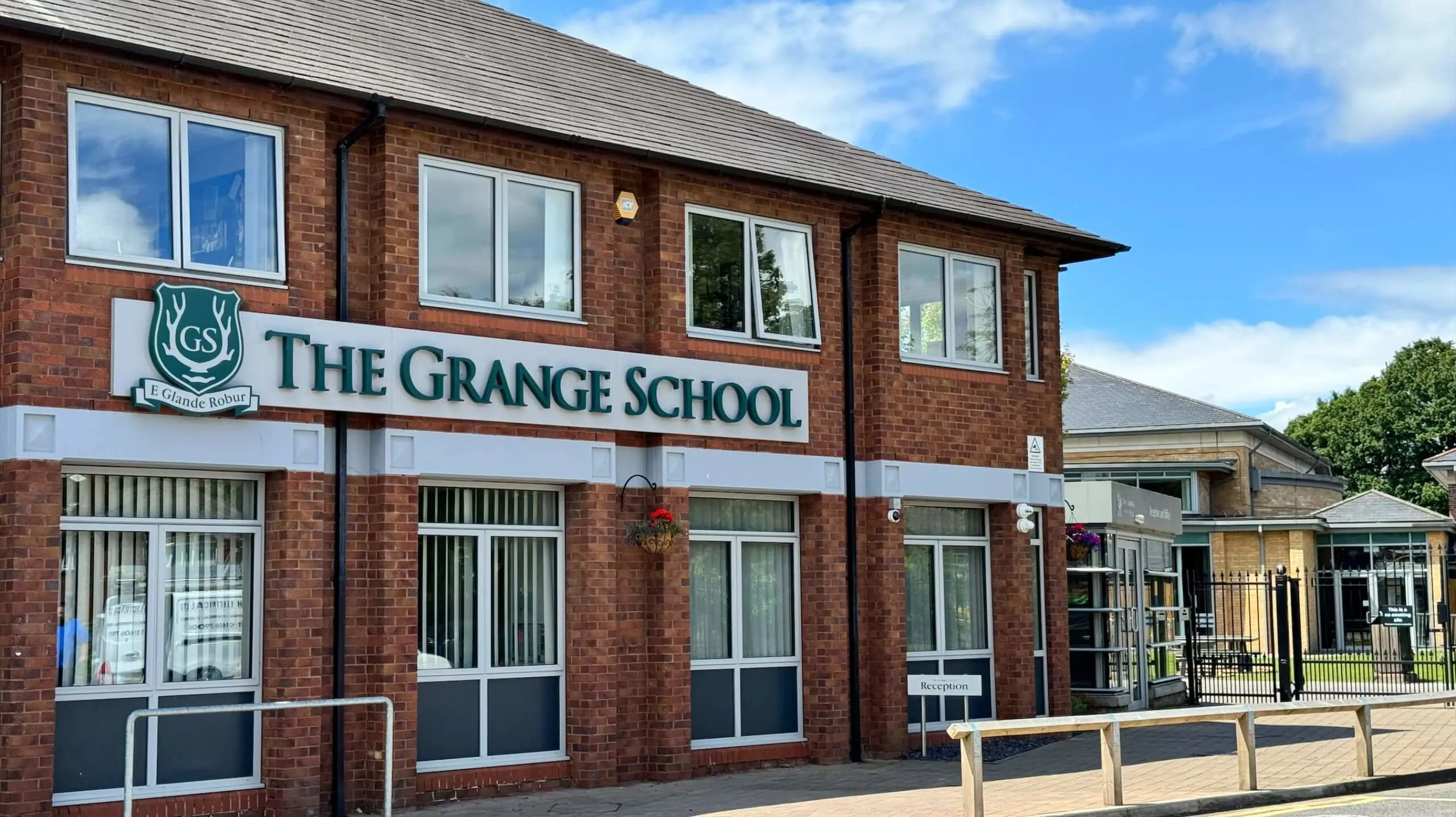 The Grange School building with sign