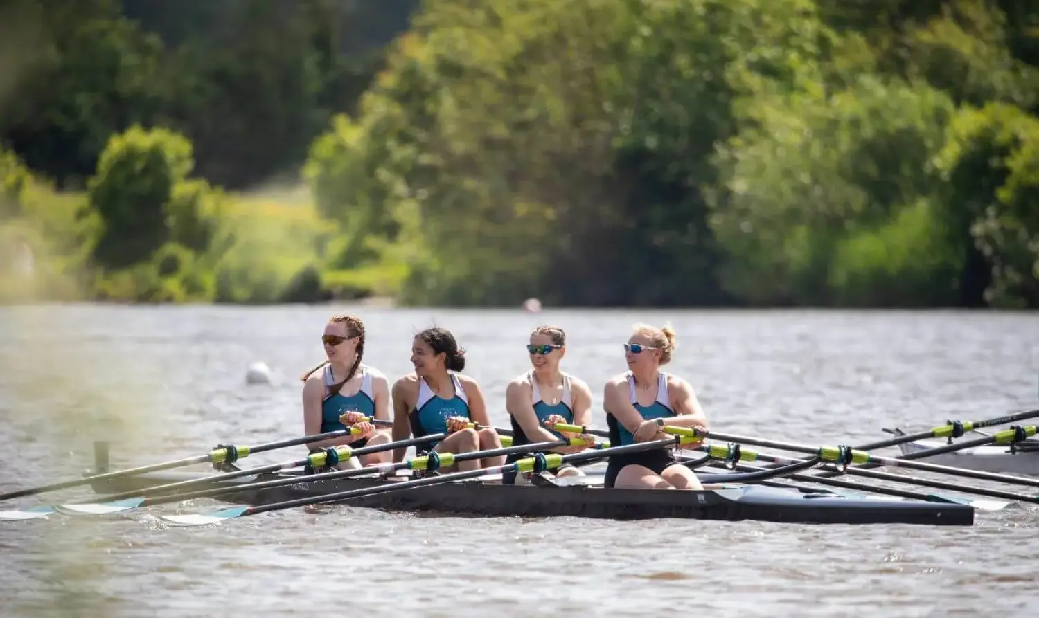 Pupils of The Grange School rowing.