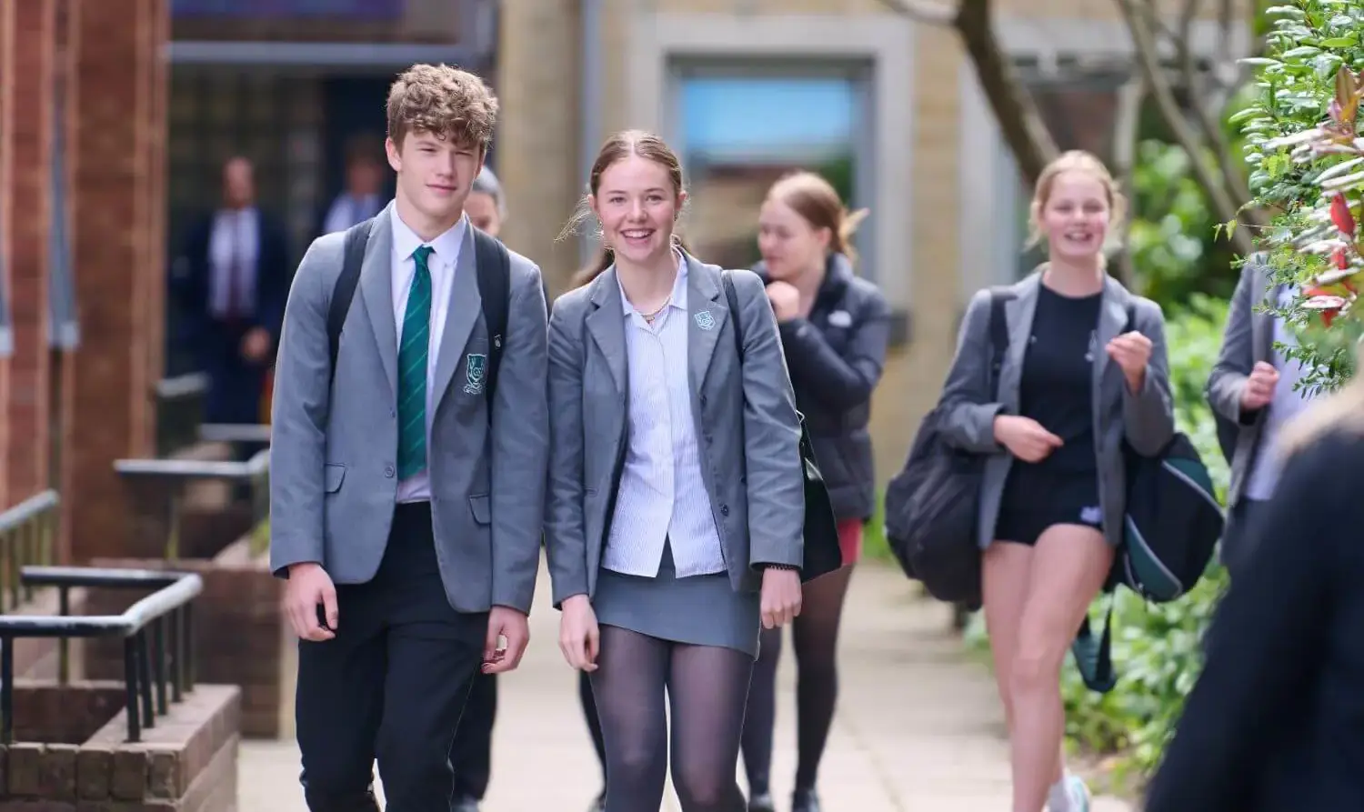 The Grange Senior School pupils walking across campus together.