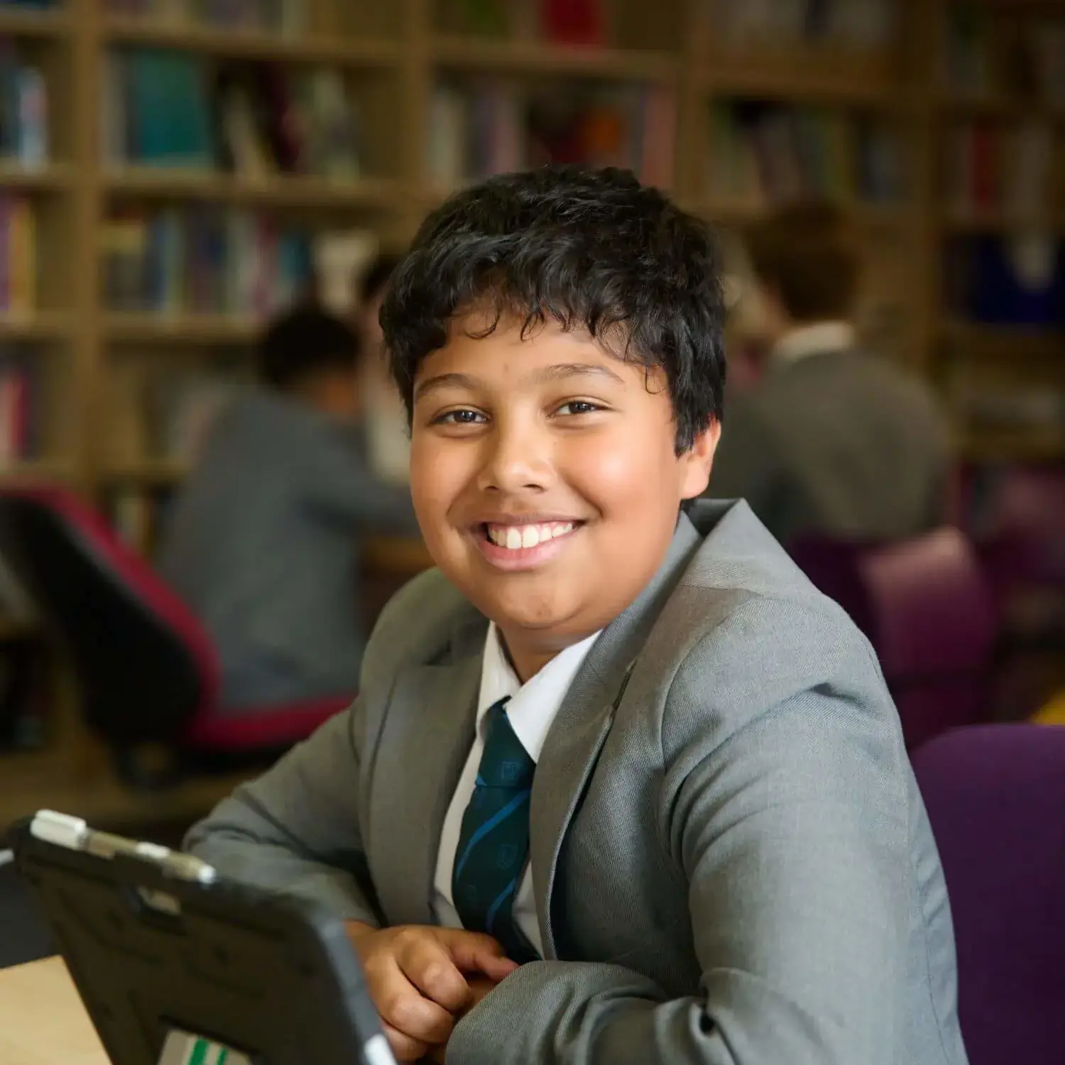 The Grange School Senior Pupil in the library.