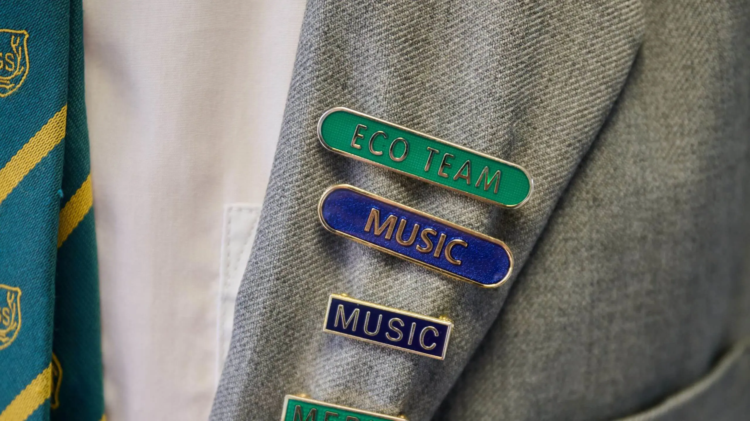 The Grange School Senior Colours & Badges on Jacket Lapel.