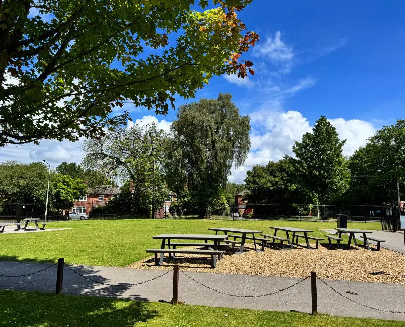 The Grange School campus with picnic benches.