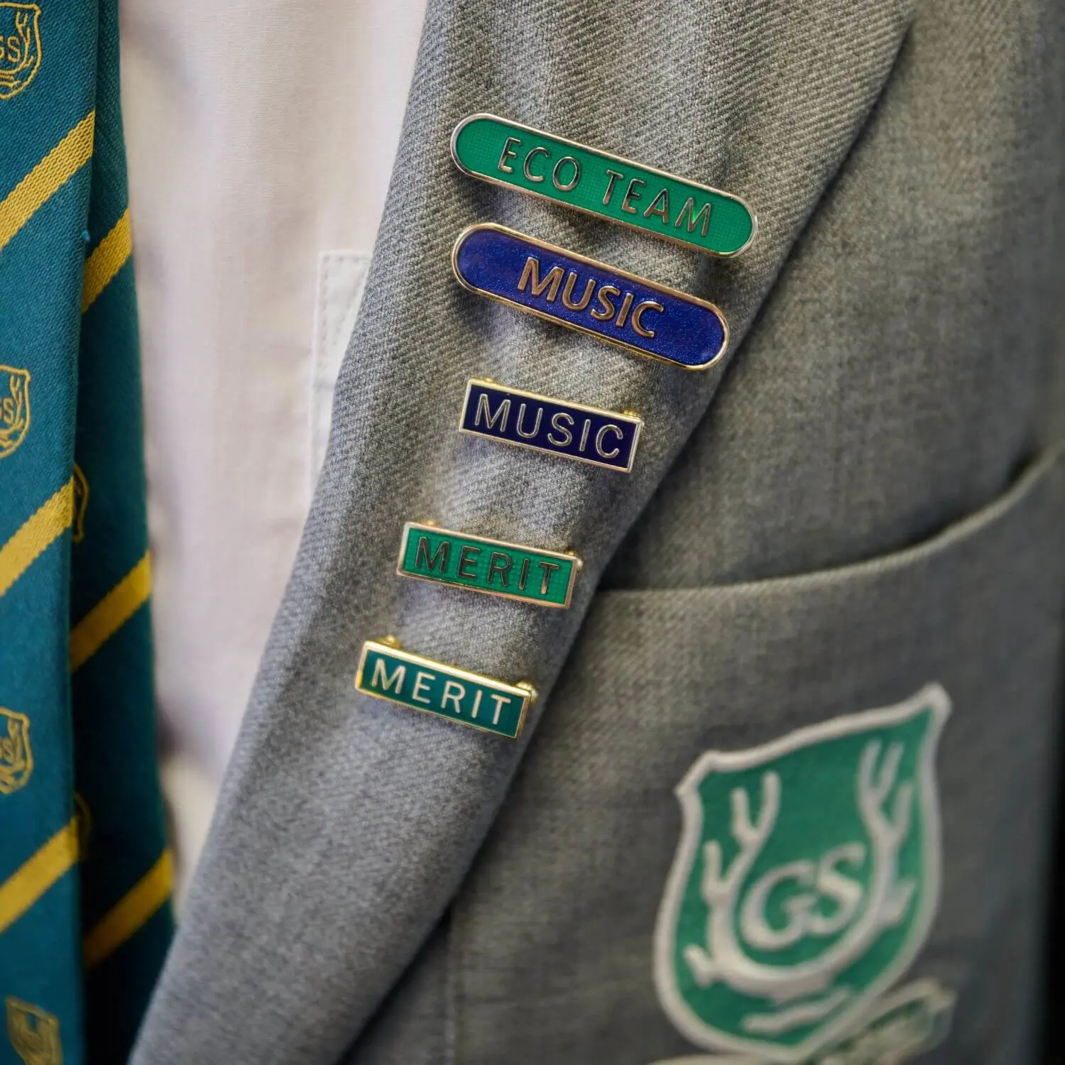 The Grange School Senior pupil jacket with colours.