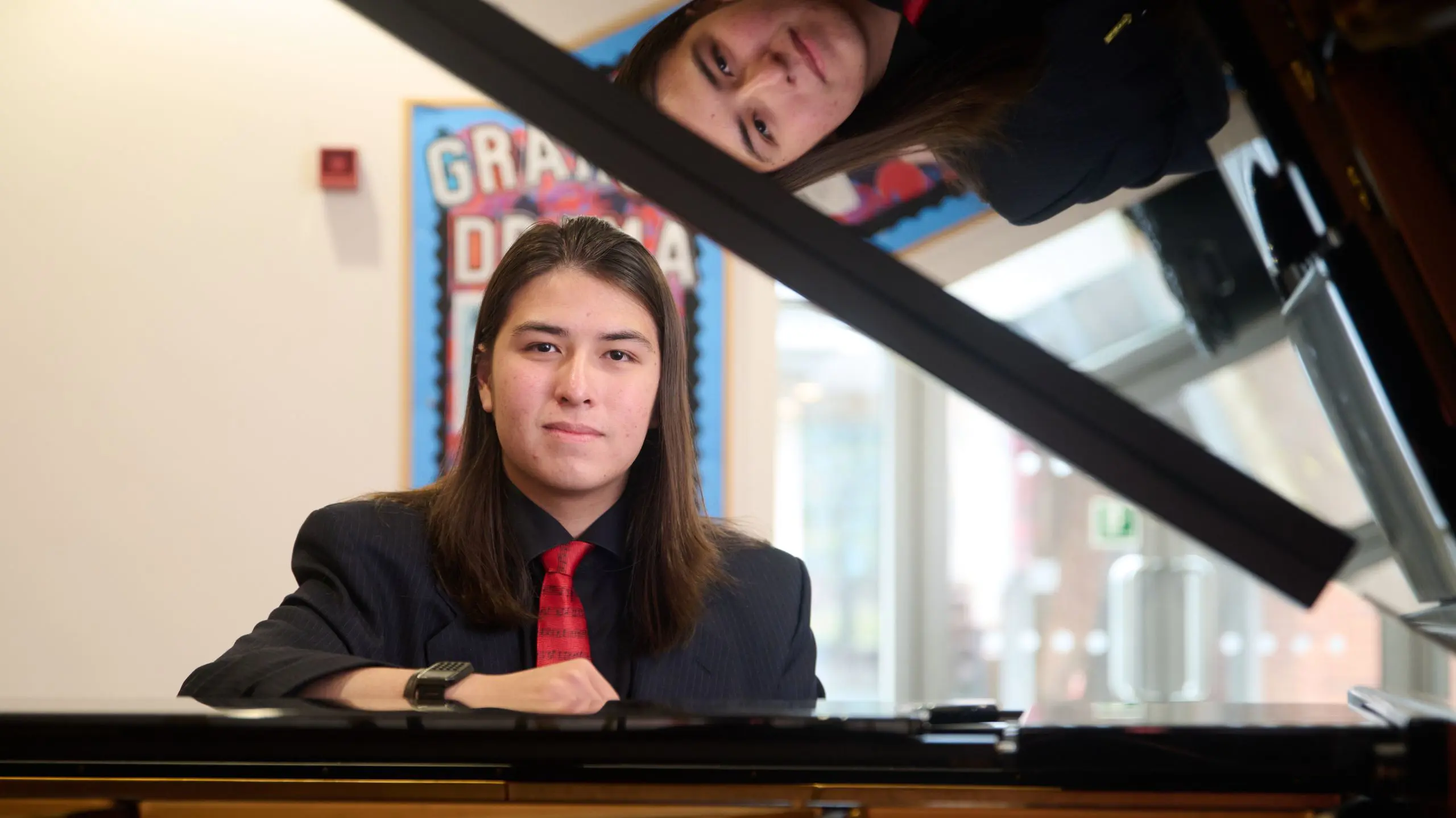 The Grange School Sixth Form Pupil with Grand Piano.