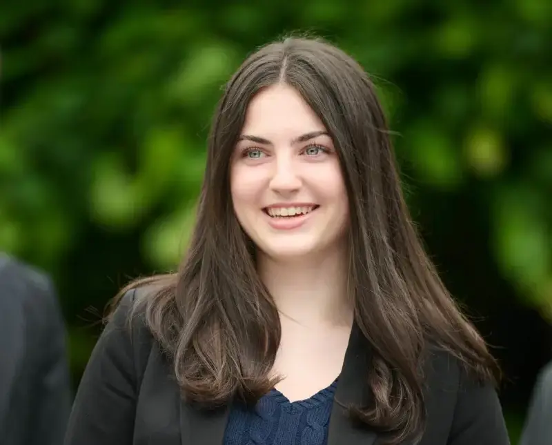 The Grange School Sixth form pupil outside.