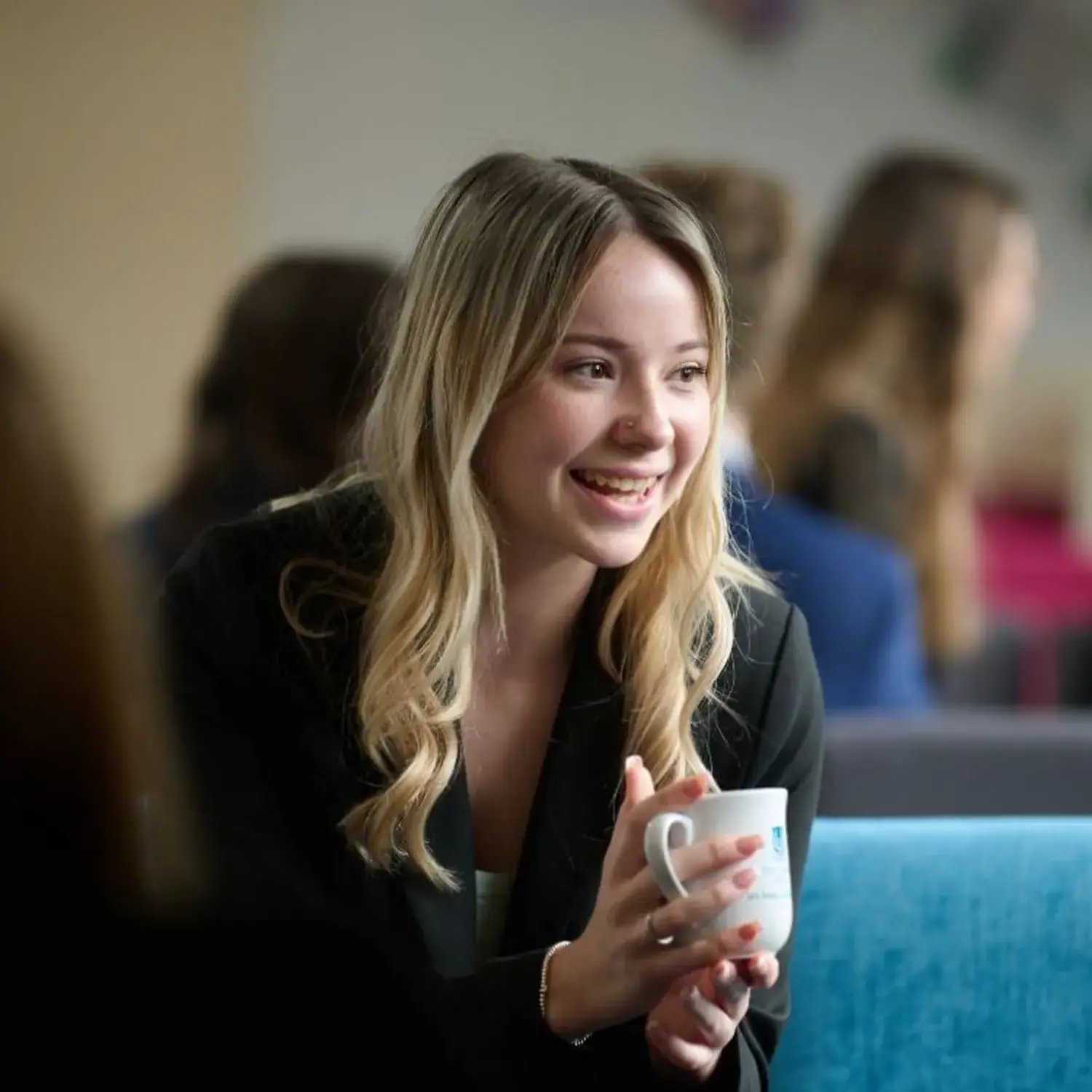 The Grange School Sixth Form Pupil enjoying a coffee in the sixth form common room.