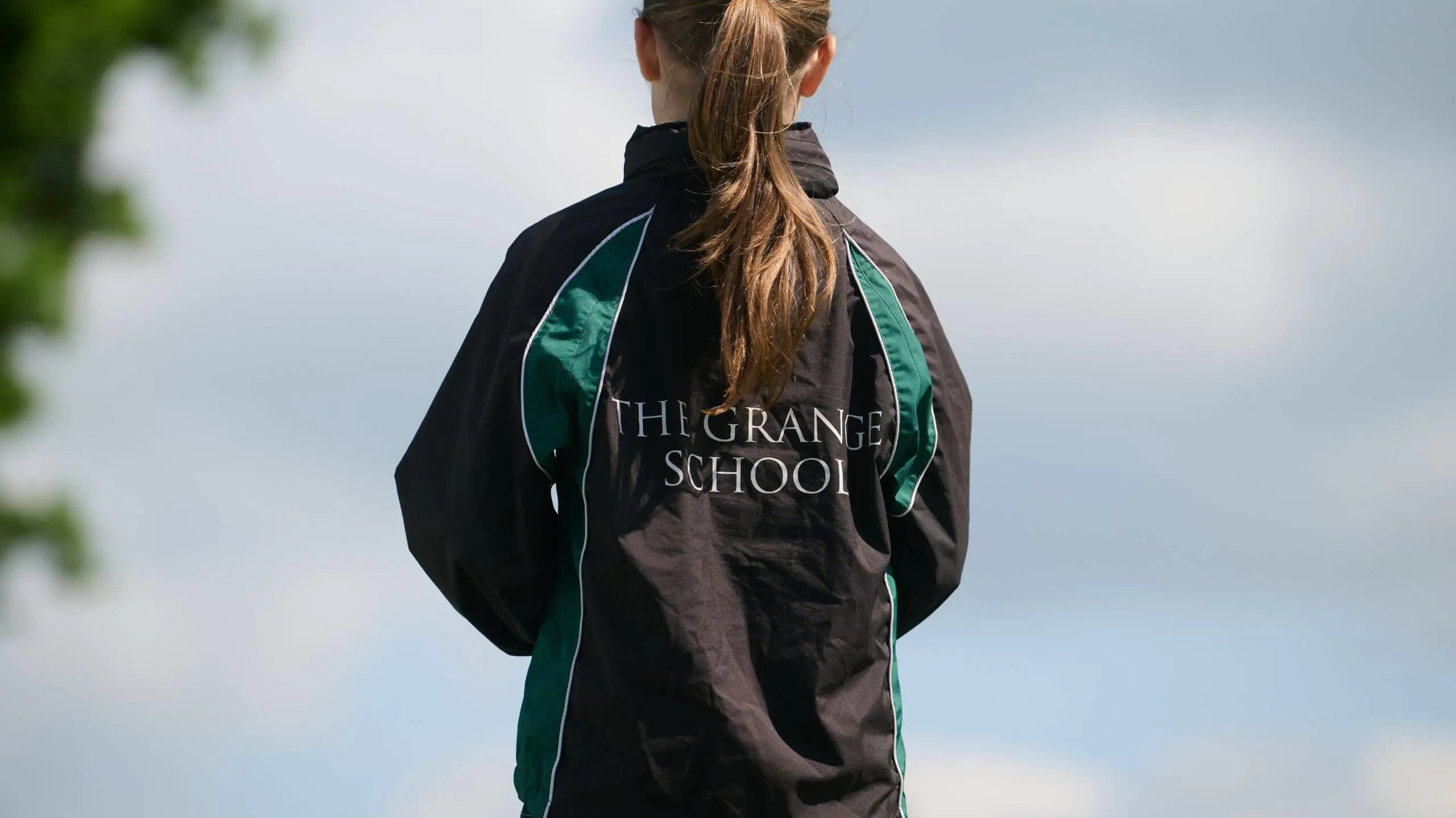 The Grange School pupil wearing school jacket.